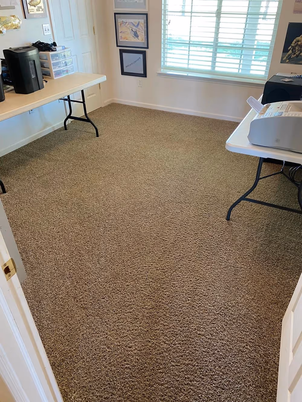 Office carpet cleaned around the desks and tables