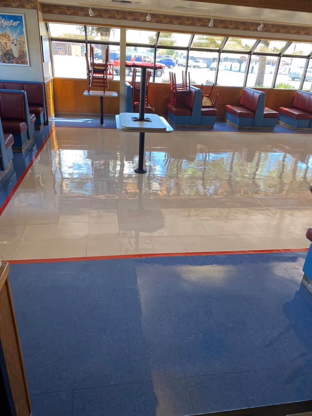 Commercial floor in a restaurant dining room after a strip and wax