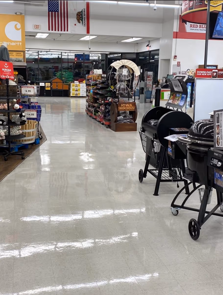 A retail aisle after the vinyl composite tile was stripped and re-waxed