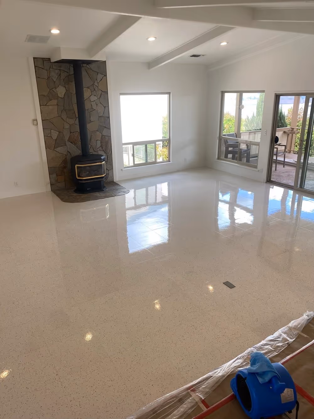 A bright great room with the tile floor cleaned and sealed